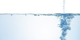 Flowing water with air bubbles.