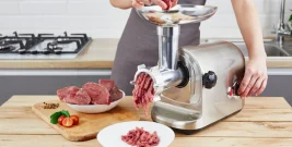 raw-meat-process-preparing-forcemeat-by-means-meat-grinder-female-hands-use-meat-chopper-kitchen_179369-65